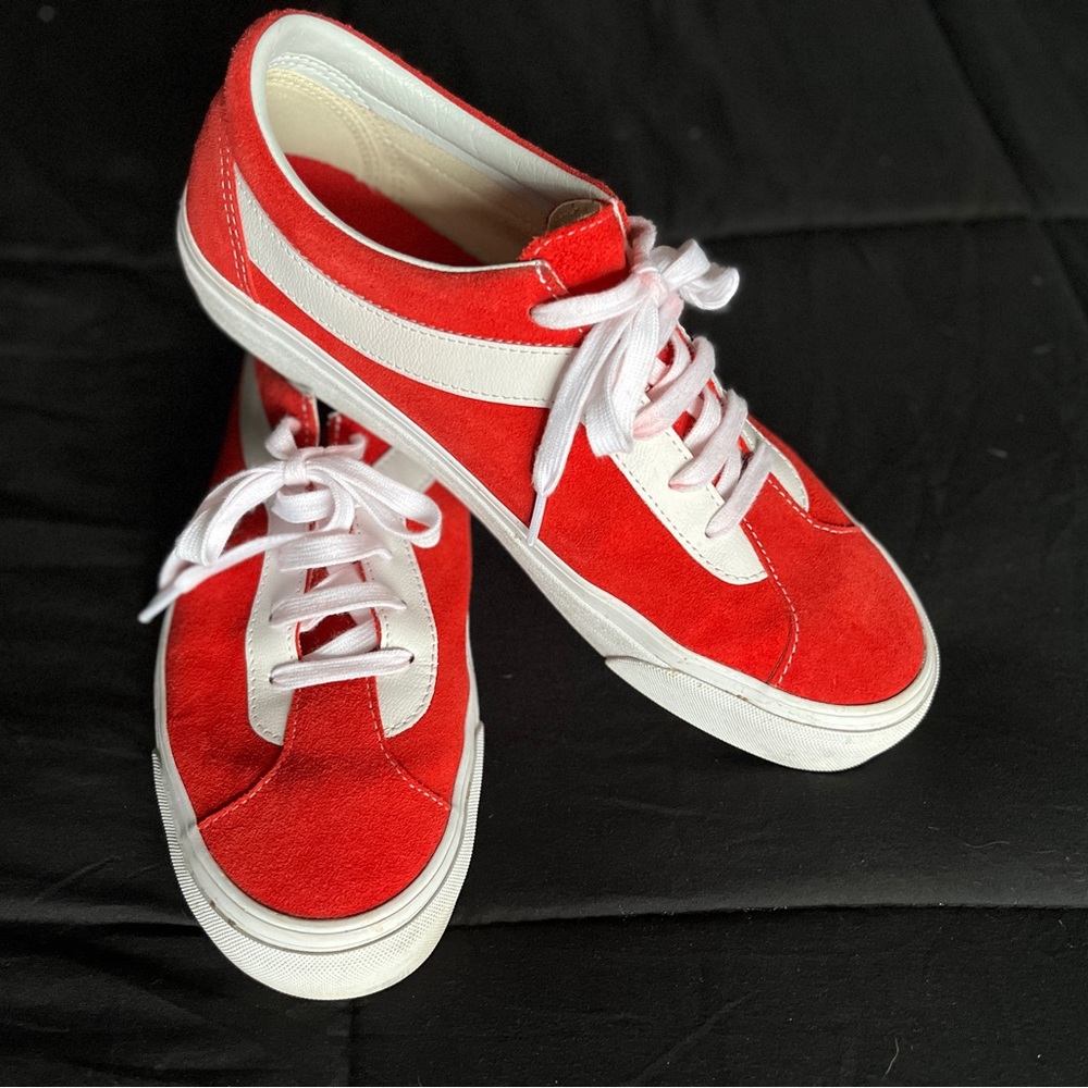 Vans. Red suede lace up vans.